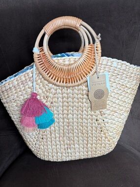 Handwoven Straw Tote with Pink & Blue Tassel Accent